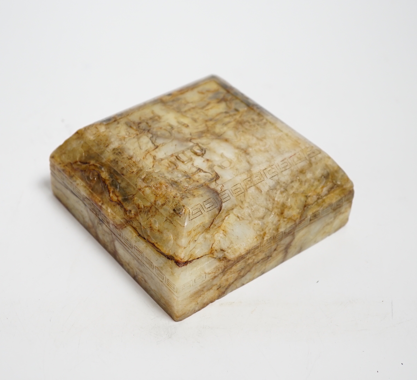 A Chinese bowenite jade scroll weight/seal, 19th/20th century
